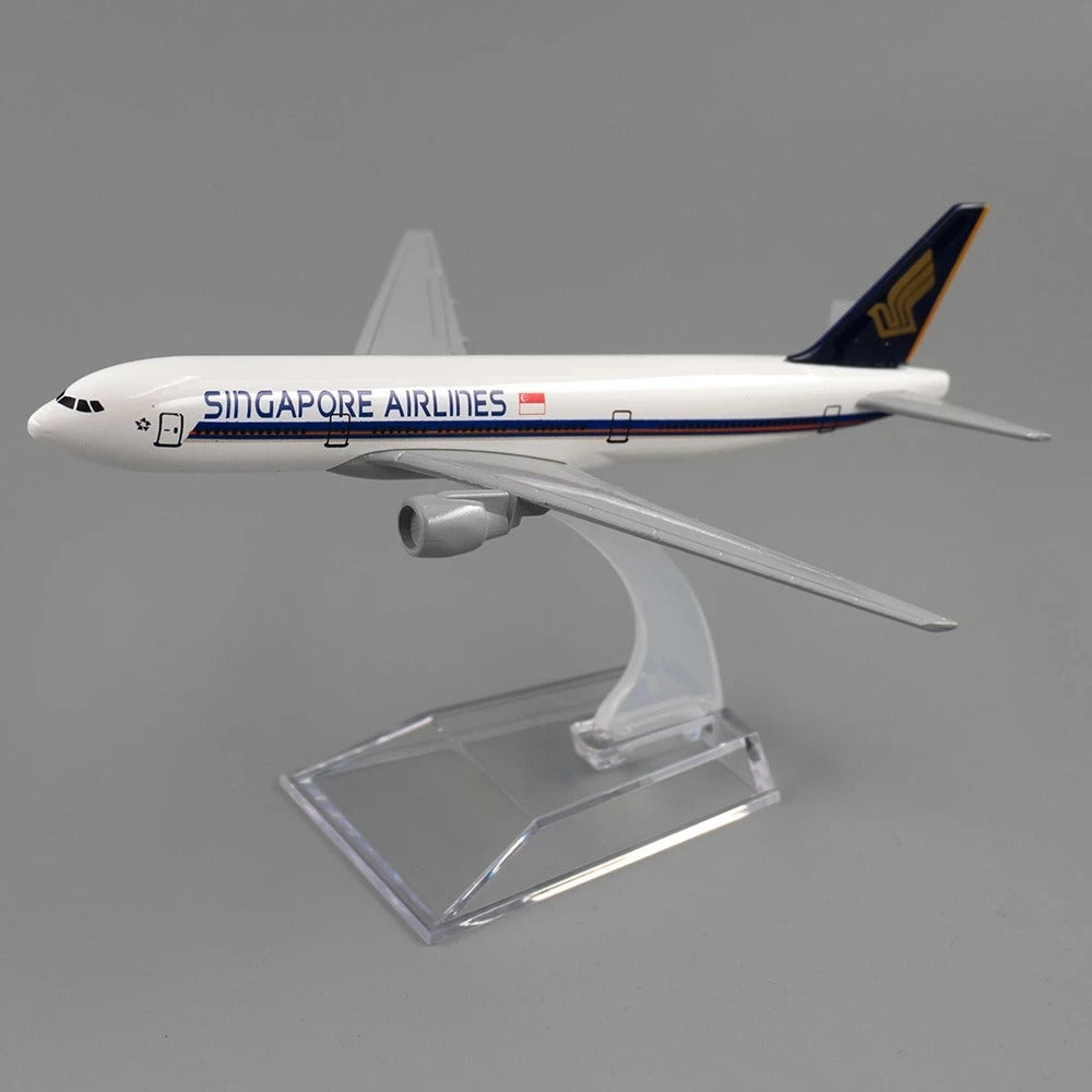 Model of a Singapore Airlines airplane on a gray background