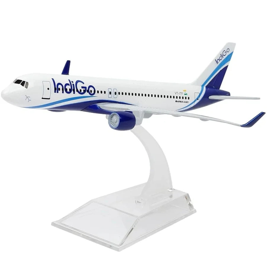 Model airplane with IndiGo branding on a white background