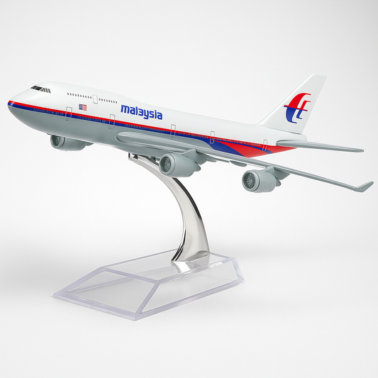 Model airplane with Malaysia Airlines logo on a white background