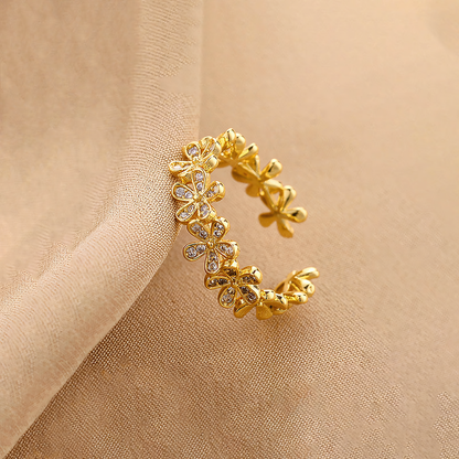 Macro detail of the Fleur gold anti-tarnish ring showing sparkling crystal flower petals