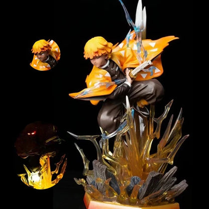 Zenitsu Agatsuma Demon Slayer statue 32 cm, crouched in a battle pose surrounded by large, yellow and orange translucent lightning effects. High-detail collectible figure.