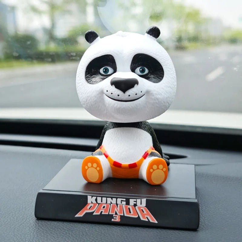 Kung Fu Panda Po bobble head toy figurine 10 cm, seated and smiling on a black display base. High-quality car dashboard collectible toy.